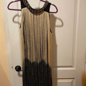 Size M it’s a Great Gatsby dress
